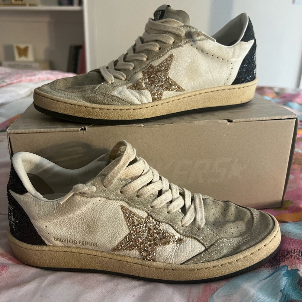 Golden Goose Ball Star Sneakers in Gold and Black
